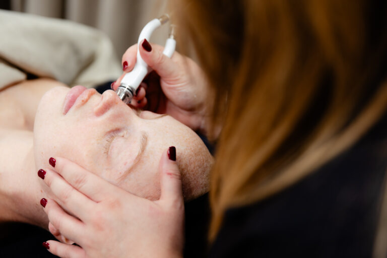 Woman getting Diamond Glow Facial