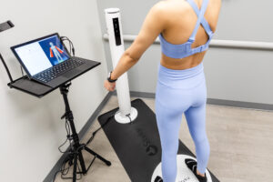 Woman standing firm on the Styku Body Scanner at our weight loss clinic near Mountain Lakes, NJ
