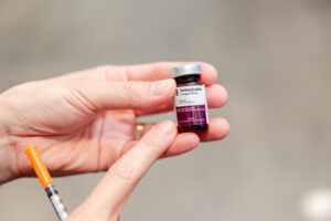 A close up on a vial for weight loss shots near Chatham, NJ