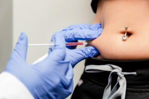 A close-up of someone receiving an injection of GLP-1 in Denville.