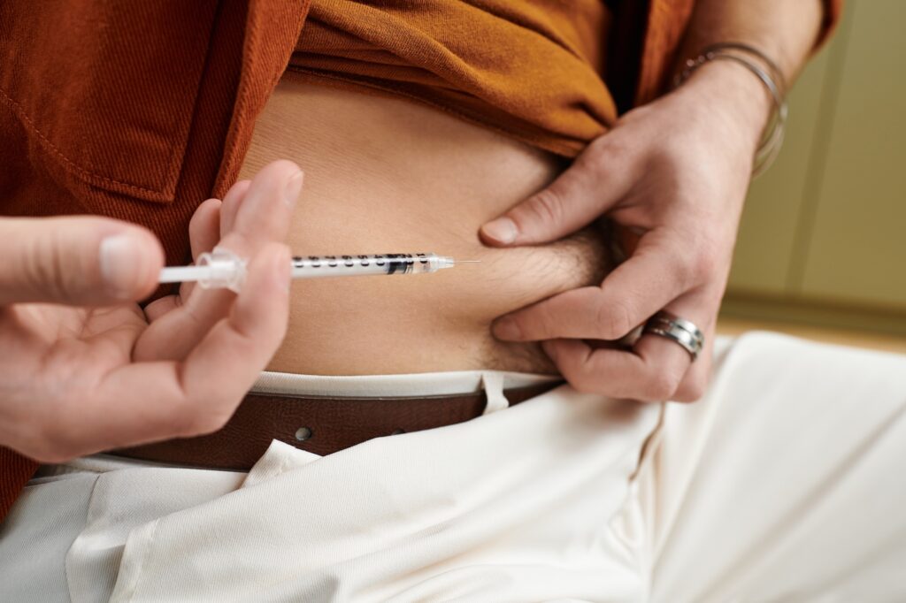 A man self-administers GLP-1 in Denville